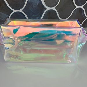 Iridescent cosmetic pouch, New.  Does have approx 3 minor marks. (shop wear)